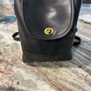 Coach Black Leather Backpack with Gold Accents